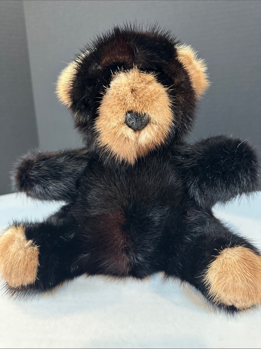 Genuine Black Mink teddy bear with brown ears, feet and face.
